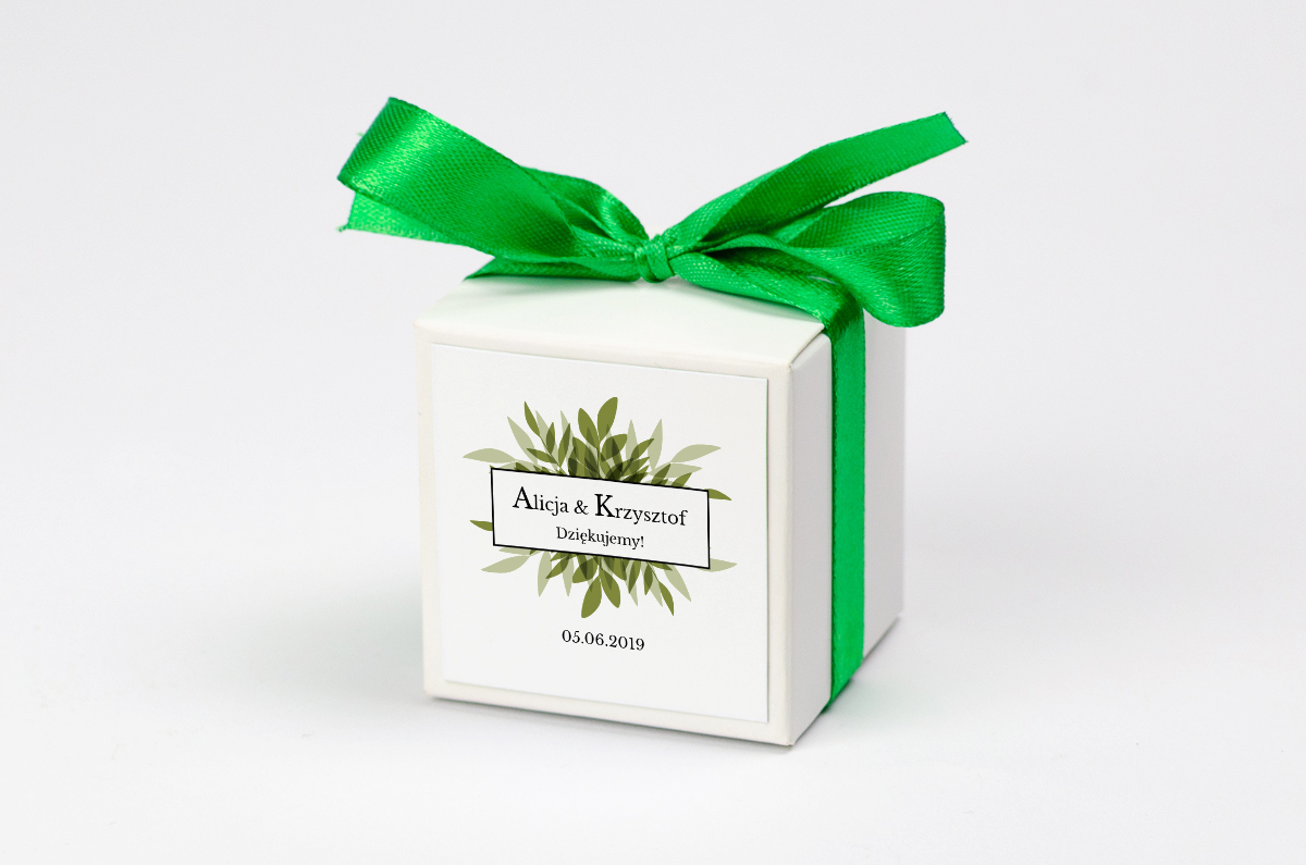 Pudełko na krówki z zieloną kokardą